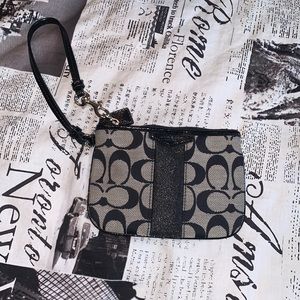 black and grey coach wristlet